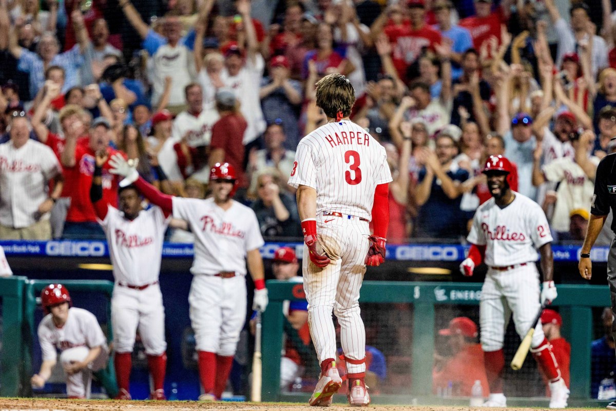 Harper is trying to pull the Phillies into October like those strongmen who pull heavy construction vehicles with their teeth.